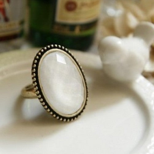 Large Oval Faceted Ring, White
